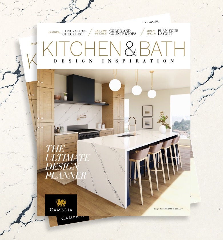 The Cambria Kitchen & Bath Design Inspiration Planner magazine is placed on a Cambria quartz countertop.