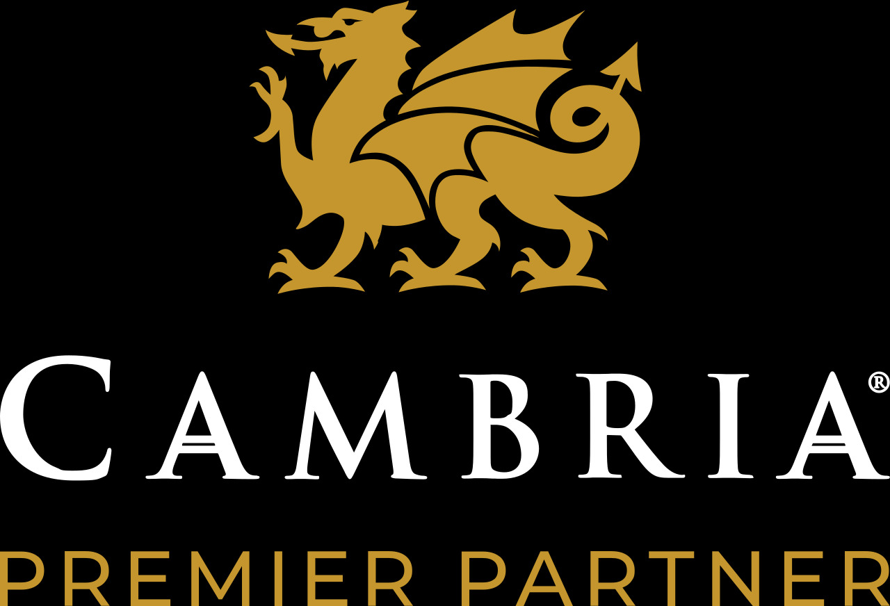 cambria-premier-partner-v-black-bkgd-rgb.svg